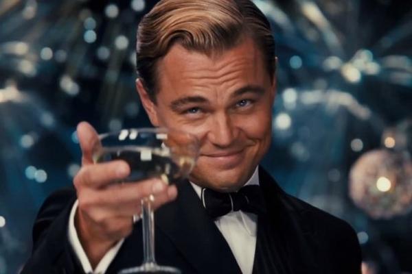 Leonardo DiCaprio raising a glass